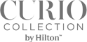The image features the logo for Curio Collection by Hilton, a brand of hotels. It displays text with the brand name in stylized font, in gray color.