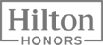 The image shows the Hilton Honors logo, with "Hilton" in large letters and "Honors" below it, both enclosed in a rectangular border.